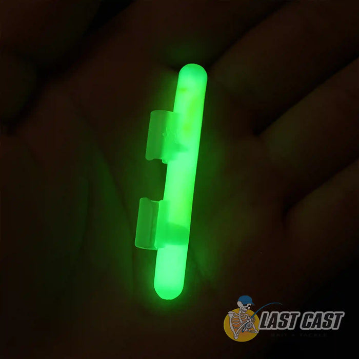 Addiction Outdoors Clip-On Light Sticks Glow in the Dark held on hand